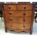 A Victorian mahogany bow fronted bedroom chest of two short over three long graduated drawers with