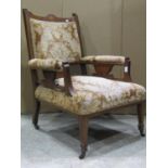 An inlaid Edwardian walnut drawing room/parlour armchair with classical urn, trailing swag and