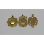 Three 9ct medal fobs to include an example awarded to Prince Laurie at the 1910 Bath Dog Show, 14.7g