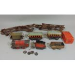 Early Hornby 0 gauge clockwork railway, unboxed, including Locomotive, tender, 2 Pullman