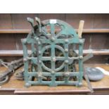 A Victorian turret clock mechanism, the two train movement within a cast iron frame with original