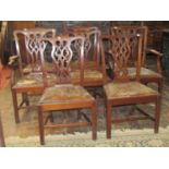 Set of eight (6&2) Georgian mahogany dining chairs with carved and pierced splat backs beneath
