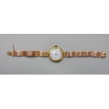 1920s 18ct lug watch, the white enamel dial with Arabic numerals, 25 mm case, 9ct rose gold block