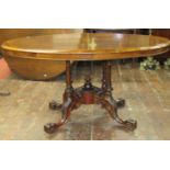 A good quality Victorian walnut and figured walnut loo table, the quarter veneered top raised on a