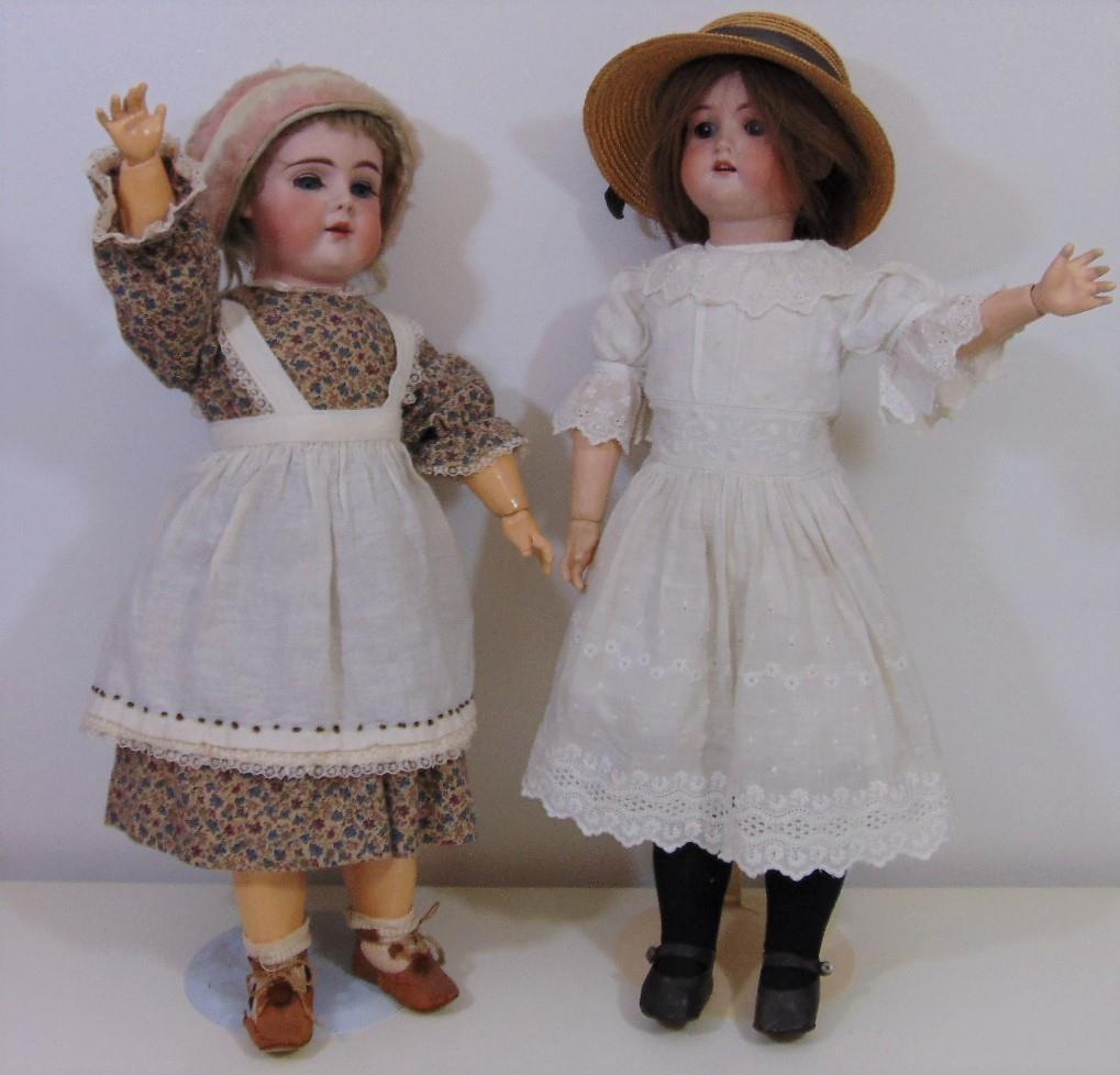 2 early 20th century bisque socket head dolls, both approx 55 cm tall with jointed composition body,