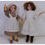 2 early 20th century bisque socket head dolls, both approx 55 cm tall with jointed composition body,