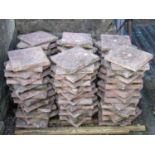 A quantity (250+) weathered simulated terracotta paving tiles, 26 cm square