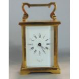 Barnard Freis of Bicester lacquered brass carriage clock, 10 cm high, key