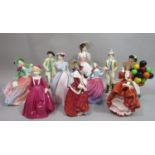 A collection of Royal Doulton figures including Autumn Breeze HN4716, Top O'The Hill, Christmas Morn