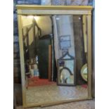 A large late Victorian/Edwardian overmantel mirror with rectangular bevelled edge plate within a