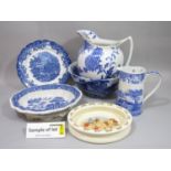 A quantity of blue and white printed wares including Copeland Spode Italian pattern flatback wall