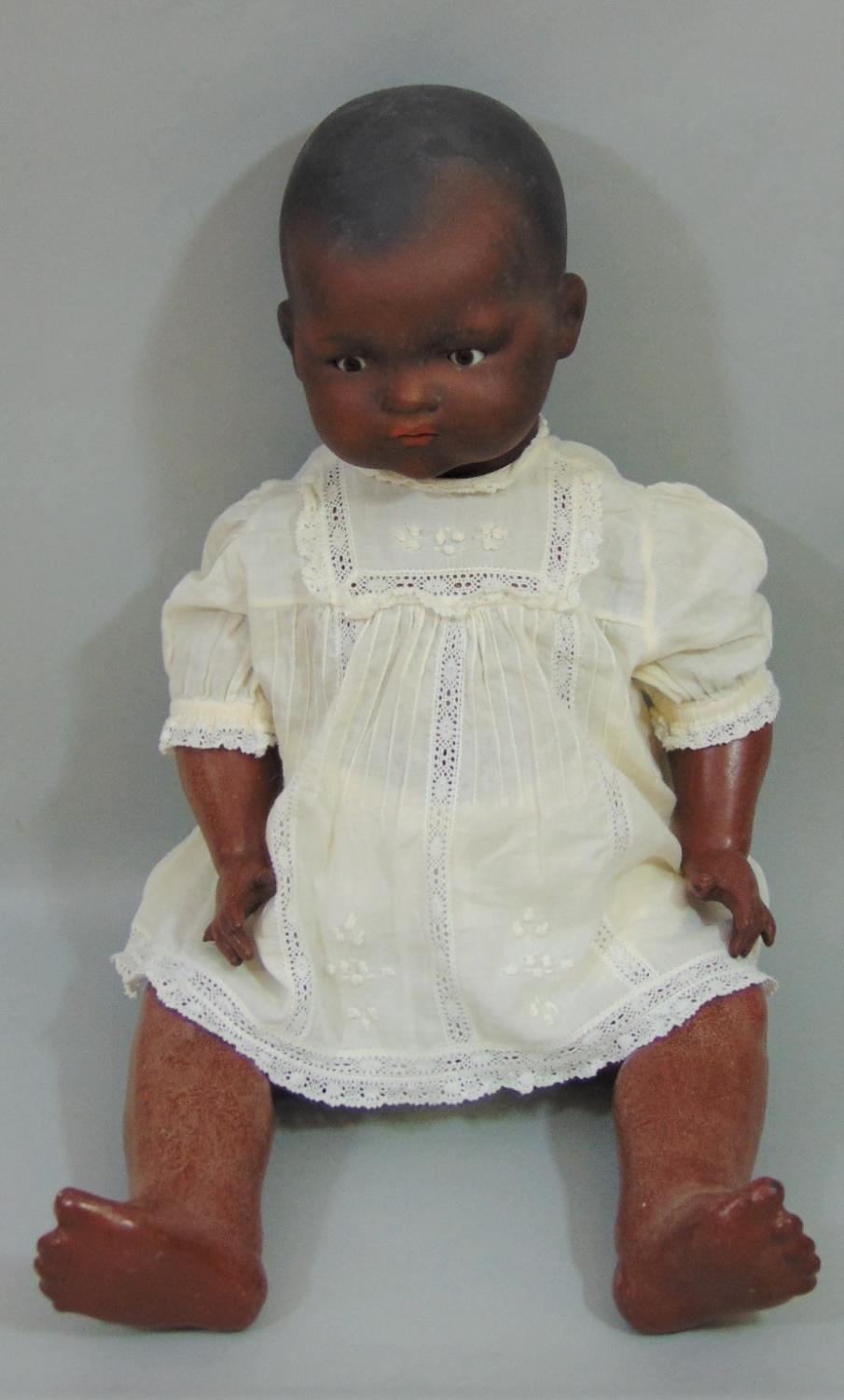 Armand Marseille black Dream Baby doll with closing brown eyes, closed mouth, period clothes, marked