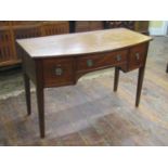 19th century mahogany bow fronted side table fitted with an arrangement of three drawers raised on