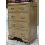 A 1930s limed oak bedroom chest of four long graduated drawers raised on ogee bracket supports, 64