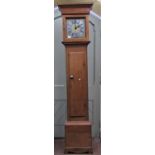 Early Georgian oak longcase clock, the hood enclosing a square cut brass dial, (28 cm), with