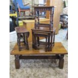 A reproduction old English style oak joint stool with arcaded frieze together with a further