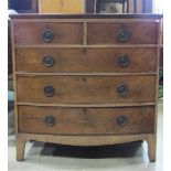 An early 19th century mahogany bow fronted bedroom chest of two short over three long graduated