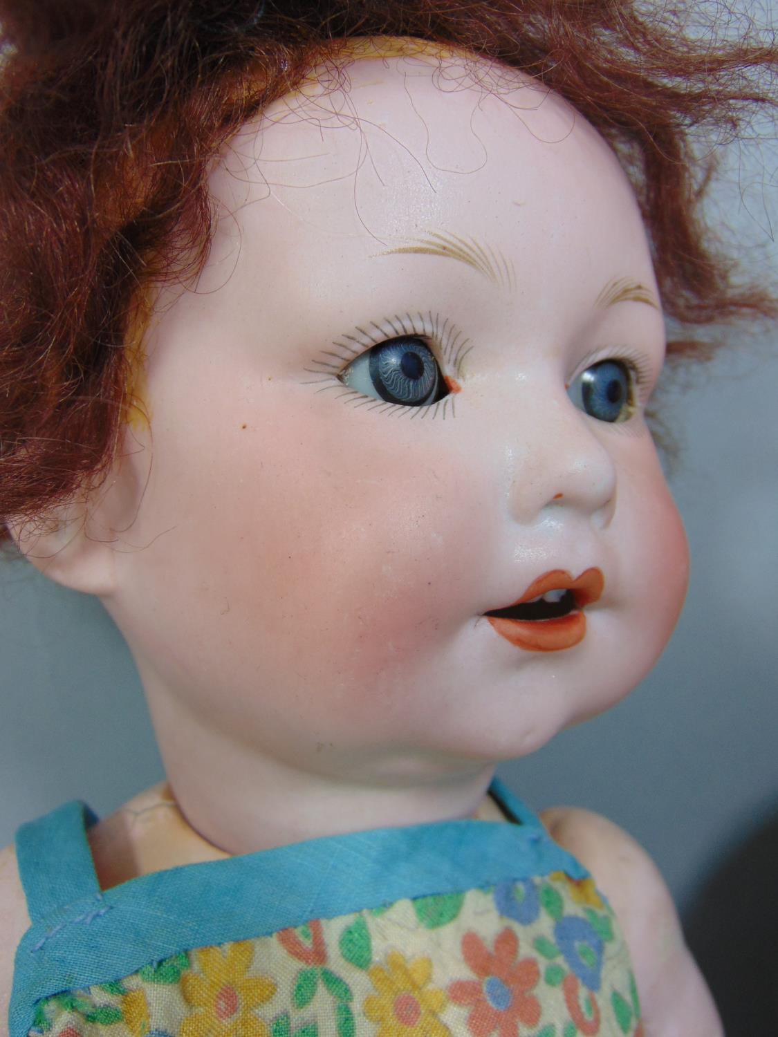 A Franz Schmidt bisque head character baby doll, with closing blue eyes and open mouth with two - Image 2 of 6