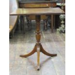A mixed wood snap top occasional table, the rectangular single piece walnut top 60 c x 61 cm, raised