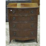 A reproduction Georgian style mahogany veneered bow fronted bedroom chest of four long graduated