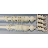 2 wooden curtain poles with rings and fixings, in painted cream, both 2m long with pole diameter