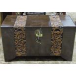 An Eastern camphor wood chest with hinged lid and carved rose banded detail, 102 cm long x 51 cm
