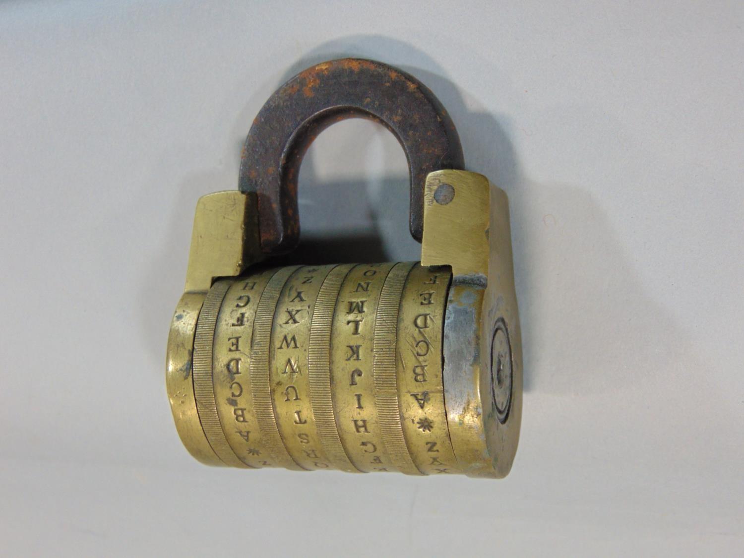 A mixed lot comprising an unusual old brass padlock with four letter combination, a leather cased - Image 3 of 4