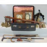 Suitcase containing 1 pair of bookends, lacquered crumb tray and brush, leather belts. 5 sticks