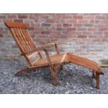 A good quality contemporary teak folding steamer type chair with slatted seat, back and foot rest