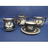 A collection of Pratts Greek pattern teawares with classical style decoration on a black ground