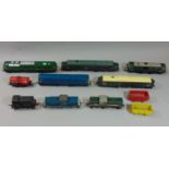 Mixed collection of unboxed model trains including HO gauge Fleischmann switcher 212 381-8, unmarked