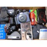 A box of mainly Polaroid instant cameras, plus others