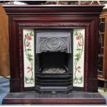 A Suncrest electric fire in the form of an Art Nouveau style cast iron fire insert flanked by