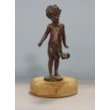 Good quality probably French cast bronze figure of a standing child wearing a loin cloth with a fly,