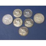 Set of five silver Bulldog award medals, each cast with a standing Bulldog dating from the early