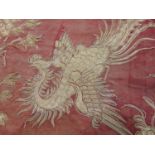 Antique Chinese textile panel comprised of several embroidered silk fabric sections stitched