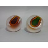 Pair of modernist Venetian style paperweights with clear glass exterior, teardrop type two tone