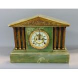 Green onyx and gilt metal architectural twin train mantle clock, in the form of a corinthian temple,