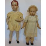 2 large vintage standing dolls, probably for shop display, with painted features, composition type