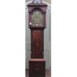 An 18th century oak longcase clock, the case with simple shell inlay detail, the trunk with reeded