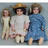 3 bisque head dolls by Armand Marseille, two have jointed composition bodies, mold 390: first doll