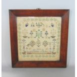 19th century needlework sampler dated 1852 and embroidered 'Susan Ford, her work May 7', showing