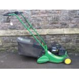 A John Deere R43RS petrol driven rotary lawn mower with rear roller and grass collection bag (