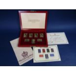 Set of seven silver gilt stamps to commemorate the 25th anniversary of QEII Coronation 1953-78