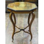 An inlaid Edwardian rosewood occasional table, the octagonal top raised on four shaped supports