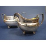 Good quality George III silver milk jug and twin handled sucrier with engraved geometric bands and