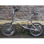 A Raleigh Burner BMX bike, with oval chrome competition section frame SR Stem, Velo seat, etc
