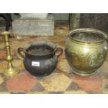 Three small contemporary terracotta urns with drop ring handles and painted and distressed finish,