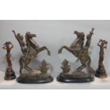 Pair of cast spelter figures of soldiers on rearing horseback, 46 cm high; together with a further