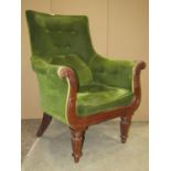 A Regency armchair with upholstered finish, swept and scrolled arms with showwood detail, raised